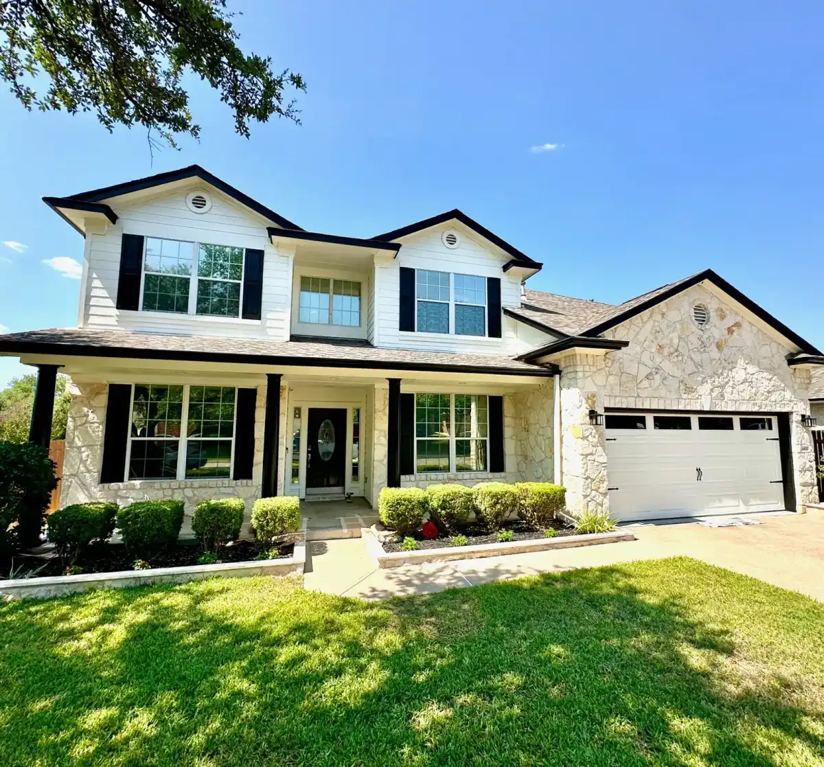White Stone & Black Shutters in Cedar Park, TX