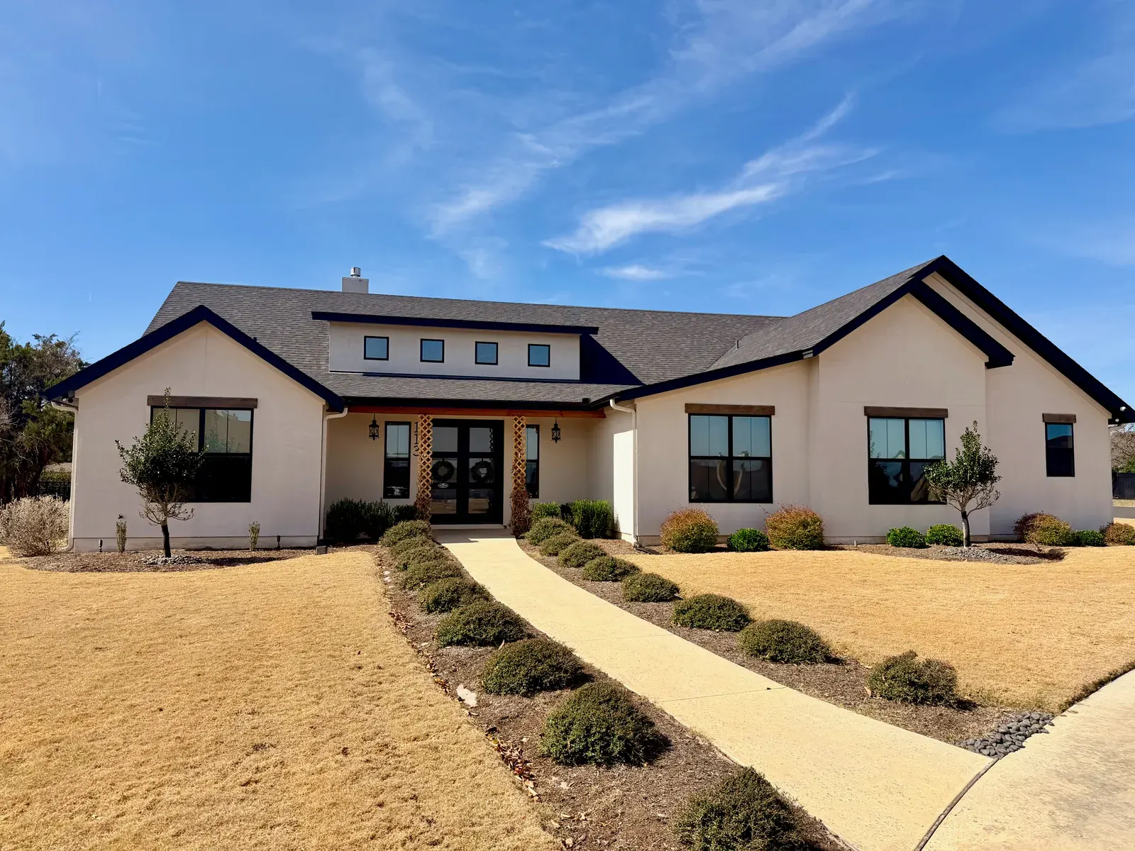 White Stucco Black Windows