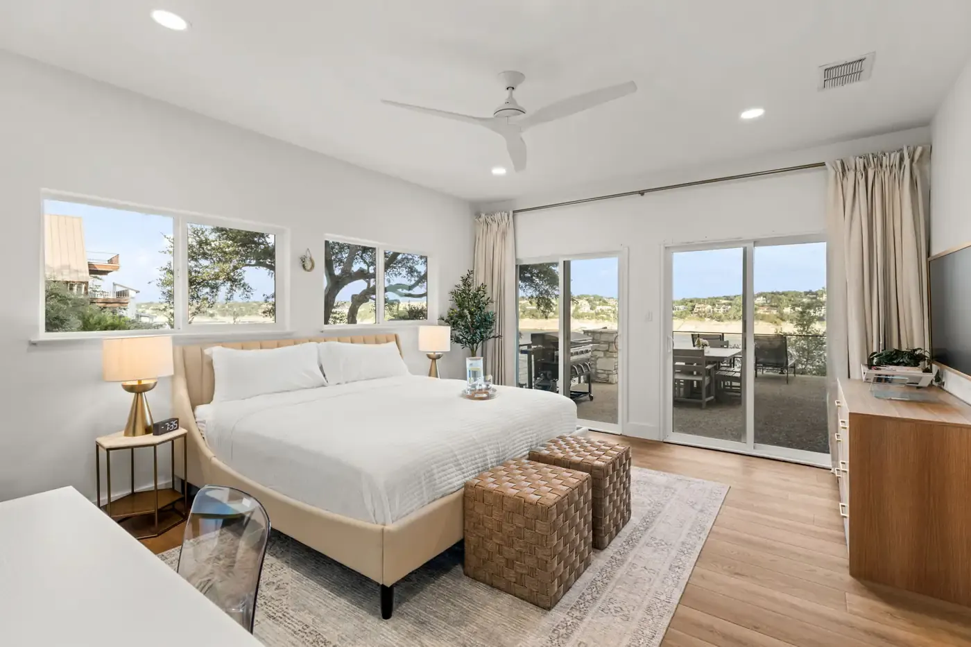 Interior bright bedroom lake view