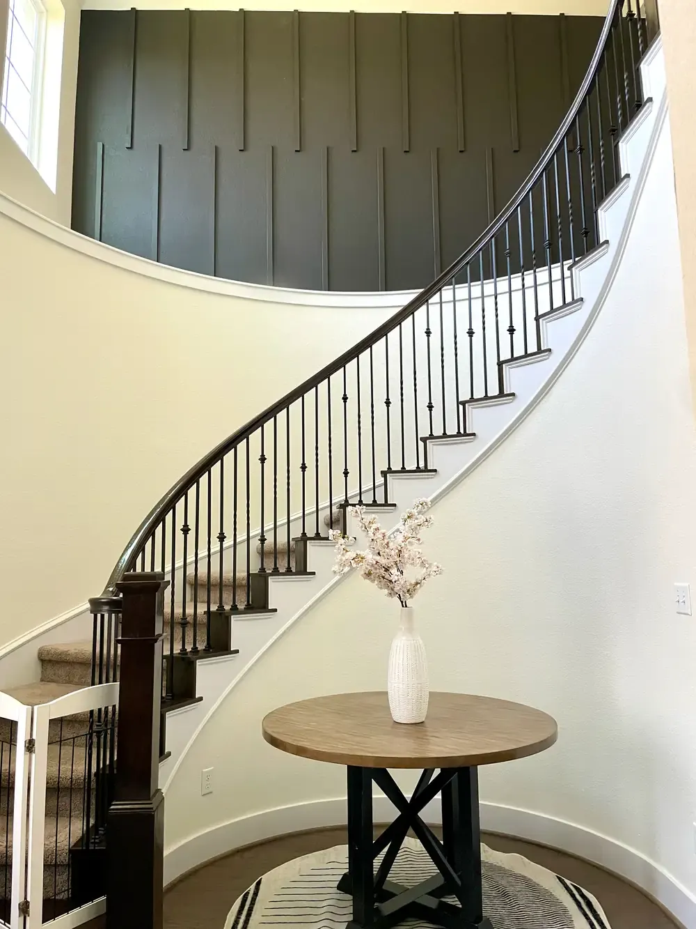Interior curved staircase accent wall